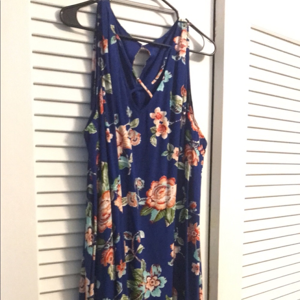 No Brand Tag. Floral Dress with Criss Cross neckline. Knee Length. Sleeveless